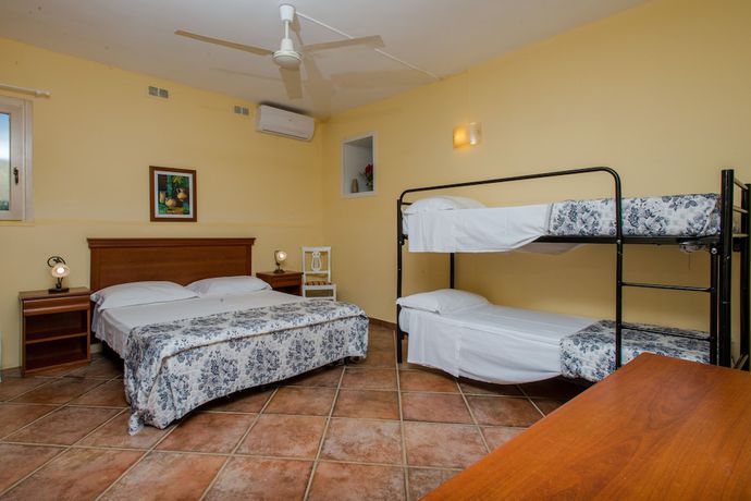 Imagen de la habitación del Hotel Relais Masseria Casina Dei Cari. Foto 13