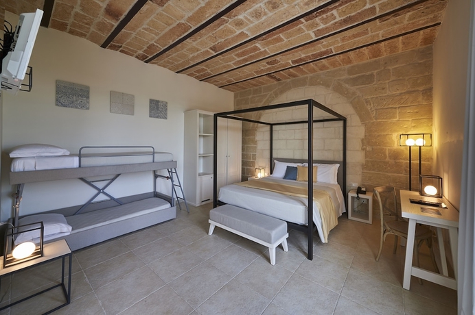 Imagen de la habitación del Hotel Relais Masseria Le Cesine - Cdshotels. Foto 12