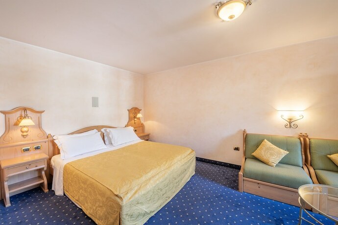 Imagen de la habitación del Hotel Relais Orsingher. Foto 19