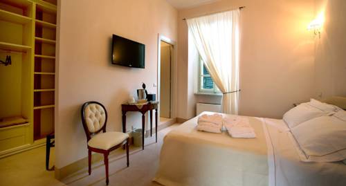 Imagen de la habitación del Hotel Relais Real Collegio. Foto 1