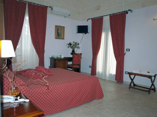 Imagen de la habitación del Hotel Relais Reggia Domizia. Foto 4