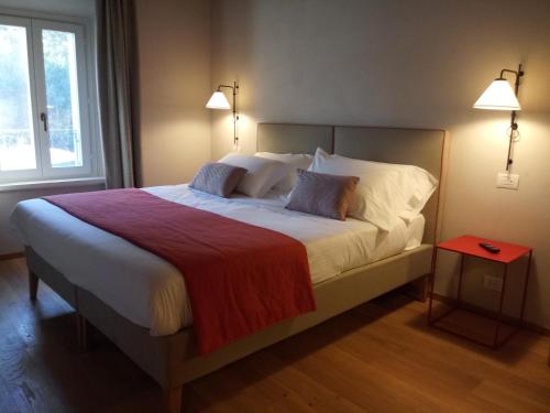 Imagen de la habitación del Hotel Relais Roncolo 1888 - Small Luxurys of the World. Foto 6