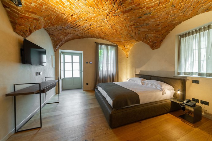 Imagen de la habitación del Hotel Relais San Vigilio al Castello. Foto 4