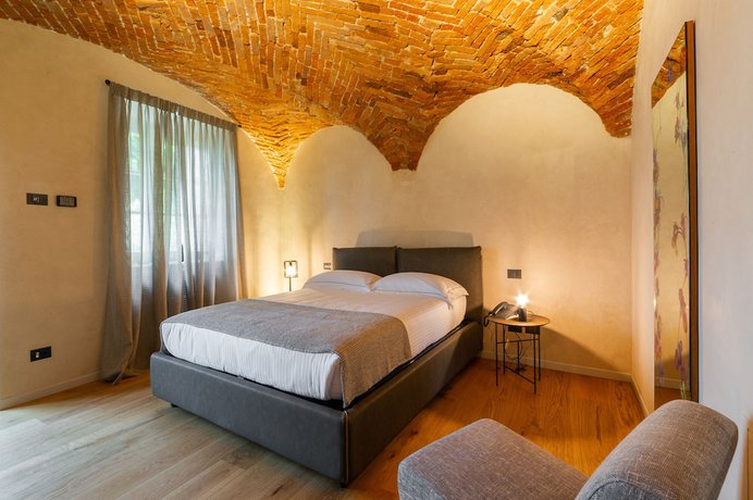 Imagen de la habitación del Hotel Relais San Vigilio al Castello. Foto 5