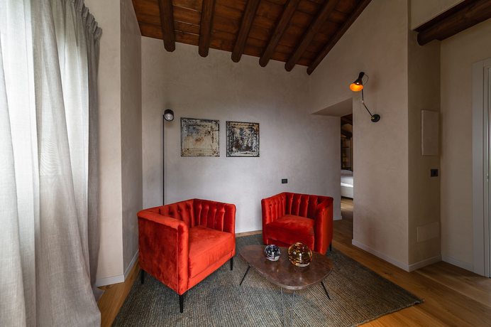 Imagen de la habitación del Hotel Relais San Vigilio al Castello. Foto 6