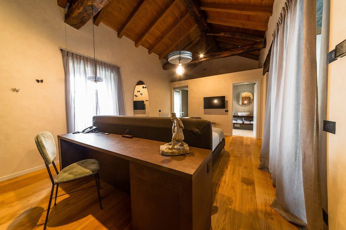 Imagen de la habitación del Hotel Relais San Vigilio al Castello. Foto 8
