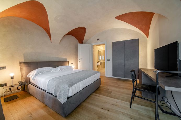 Imagen de la habitación del Hotel Relais San Vigilio al Castello. Foto 9