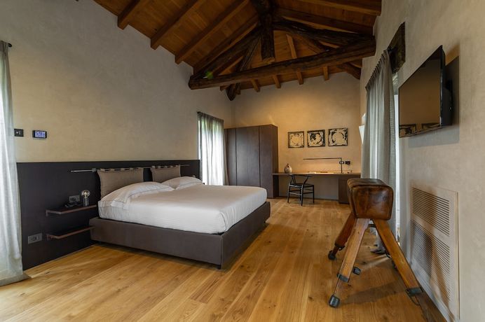Imagen de la habitación del Hotel Relais San Vigilio al Castello. Foto 10