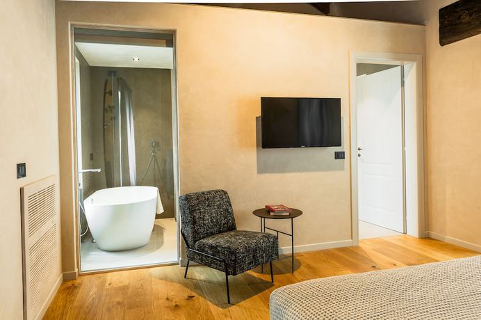 Imagen de la habitación del Hotel Relais San Vigilio al Castello. Foto 15