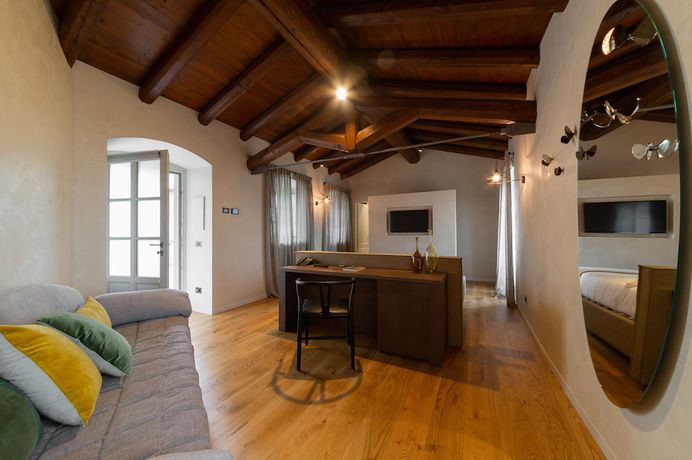 Imagen de la habitación del Hotel Relais San Vigilio al Castello. Foto 16