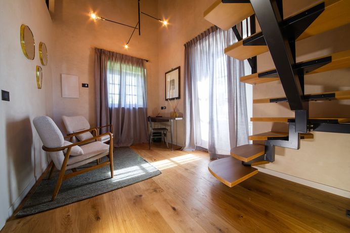 Imagen de la habitación del Hotel Relais San Vigilio al Castello. Foto 18