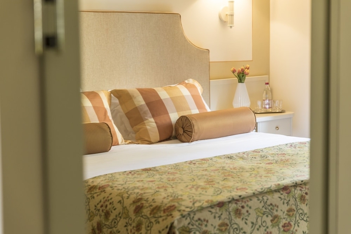 Imagen de la habitación del Hotel Relais Santa Chiara - Tuscany Charme. Foto 3