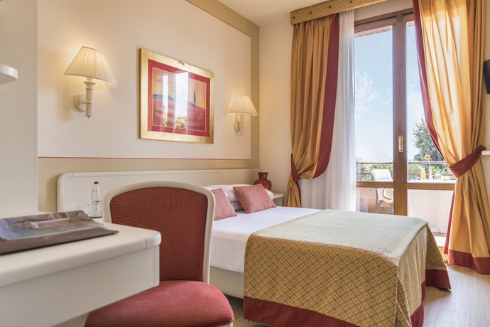 Imagen de la habitación del Hotel Relais Santa Chiara - Tuscany Charme. Foto 8