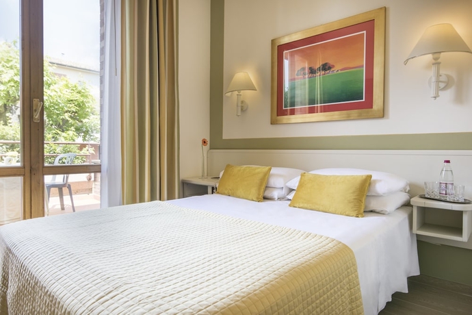 Imagen de la habitación del Hotel Relais Santa Chiara - Tuscany Charme. Foto 12
