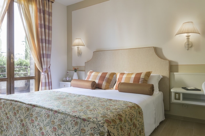 Imagen de la habitación del Hotel Relais Santa Chiara - Tuscany Charme. Foto 18