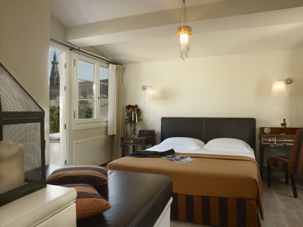 Imagen de la habitación del Hotel Relais Santa Croce By Baglioni Hotels. Foto 11