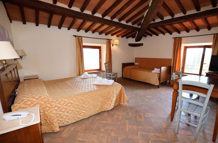 Imagen de la habitación del Hotel Relais Santa Genoveffa. Foto 9