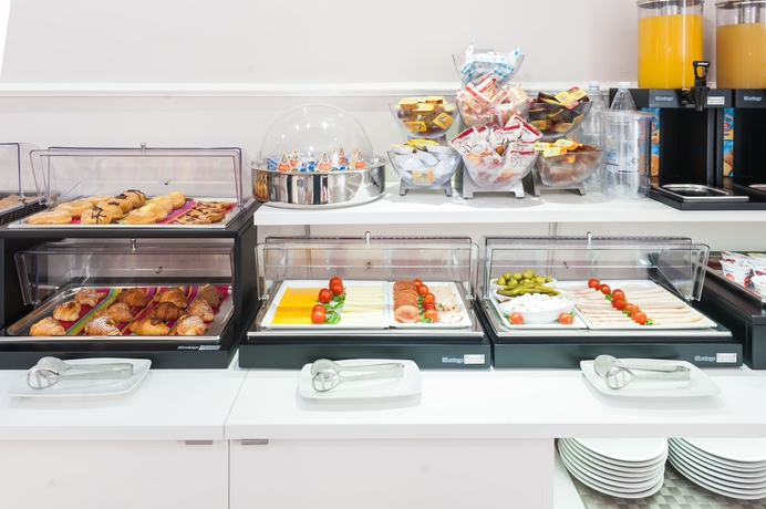 Imagen del bar/restaurante del Hotel Relais Trevi 95 Boutique. Foto 11