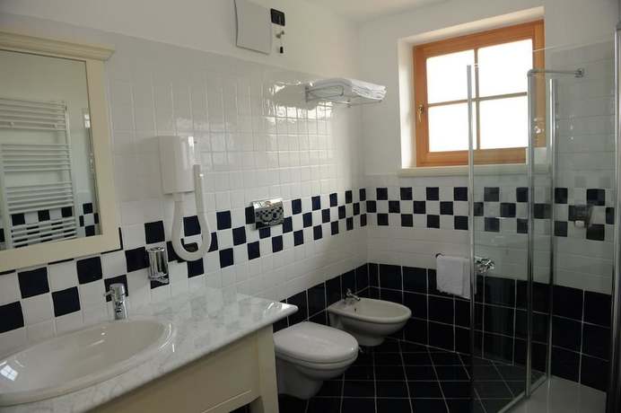 Imagen de la habitación del Hotel Relais Vecchio Maso. Foto 4