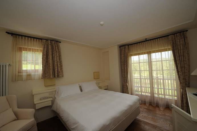 Imagen de la habitación del Hotel Relais Vecchio Maso. Foto 6