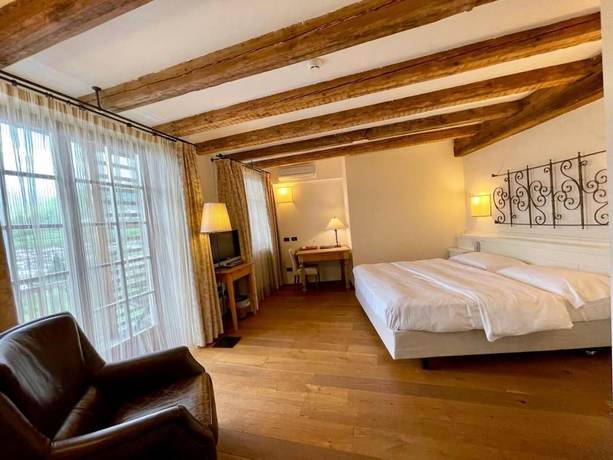 Imagen de la habitación del Hotel Relais Vecchio Maso. Foto 8