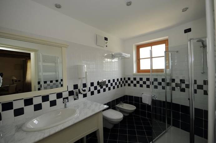 Imagen de la habitación del Hotel Relais Vecchio Maso. Foto 15