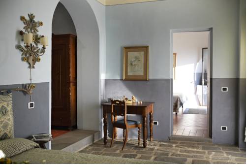 Imagen de la habitación del Hotel Relais Villa Belpoggio - Residenza D'epoca. Foto 11