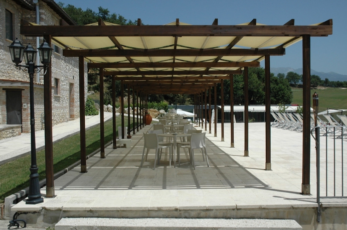 Imagen del bar/restaurante del Hotel Relais Villa D'assio. Foto 2