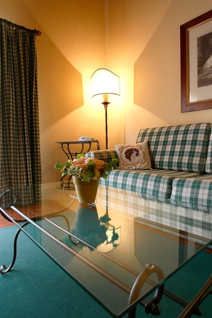 Imagen de la habitación del Hotel Relais Villa Olmo. Foto 5