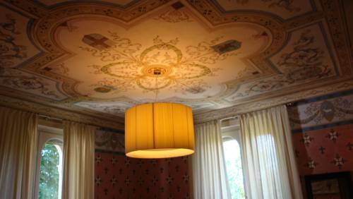 Imagen de la habitación del Hotel Relais Villa Pattono. Foto 16