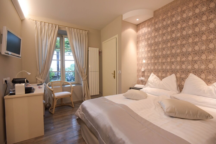 Imagen de la habitación del Hotel Relais Villa Porta. Foto 5