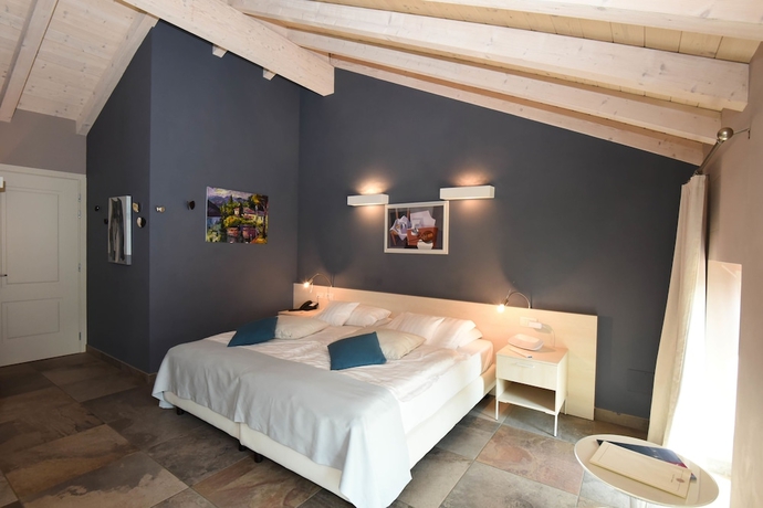 Imagen de la habitación del Hotel Relais Villa Porta. Foto 12