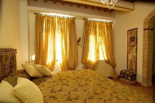 Imagen de la habitación del Hotel Relais Villa Roncuzzi. Foto 6