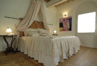 Imagen de la habitación del Hotel Relais Villa Roncuzzi. Foto 8