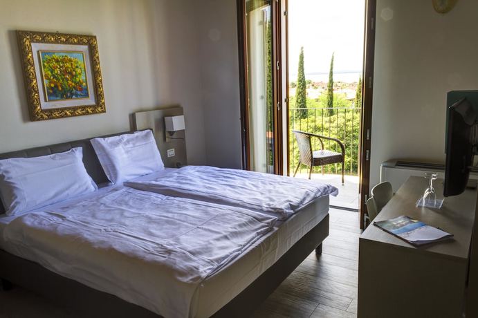 Imagen de la habitación del Hotel Relais agli Olivi. Foto 7