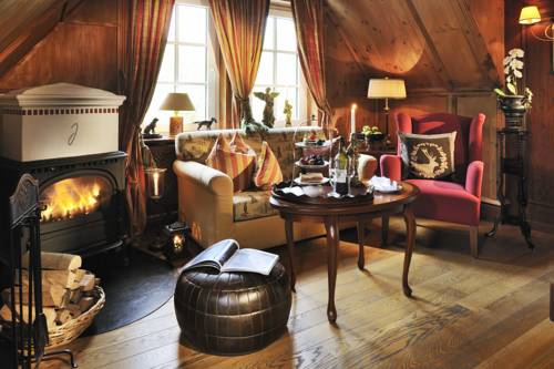 Imagen de la habitación del Hotel Relais & Ch&acirc;teaux Jagdhof Glash&uuml;tte. Foto 13