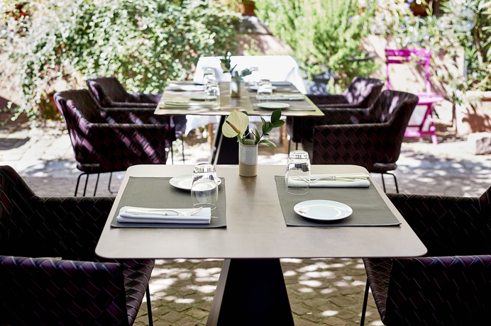 Imagen del bar/restaurante del Hotel Relais & Châteaux La Maison Des Têtes. Foto 5