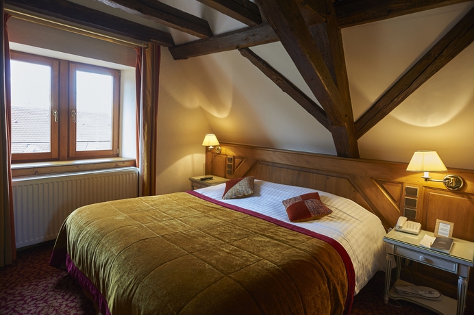 Imagen de la habitación del Hotel Relais & Châteaux La Maison Des Têtes. Foto 13