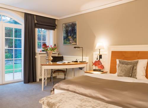 Imagen de la habitación del Hotel Relais & Châteaux Landhaus Stricker. Foto 3