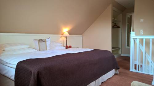 Imagen de la habitación del Hotel Relais & Châteaux Landhaus Stricker. Foto 6