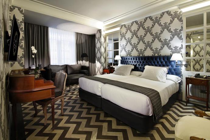 Imagen de la habitación del Hotel Relais & Chateaux Heritage Madrid. Foto 6