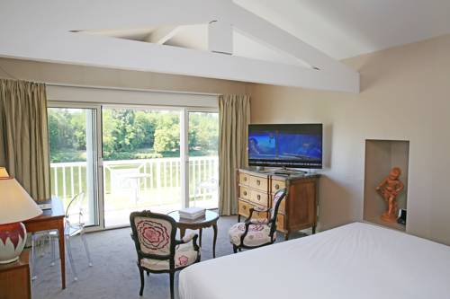 Imagen de la habitación del Hotel Relais and Châteaux La Réserve. Foto 5