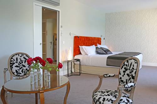 Imagen de la habitación del Hotel Relais and Châteaux La Réserve. Foto 9