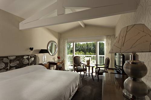 Imagen de la habitación del Hotel Relais and Châteaux La Réserve. Foto 11