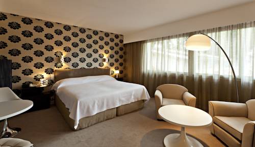 Imagen de la habitación del Hotel Relais and Châteaux La Réserve. Foto 12