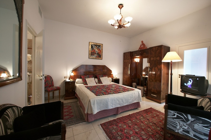 Imagen de la habitación del Hotel Relais and Ch&acirc;teaux Parc Victoria. Foto 5