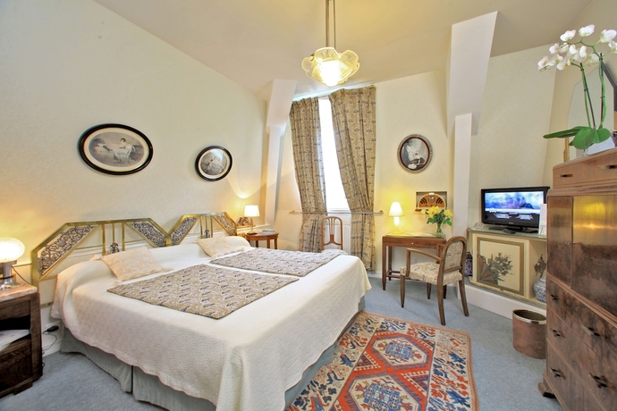 Imagen de la habitación del Hotel Relais and Ch&acirc;teaux Parc Victoria. Foto 6