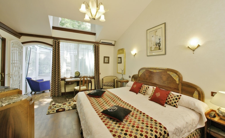 Imagen de la habitación del Hotel Relais and Ch&acirc;teaux Parc Victoria. Foto 16