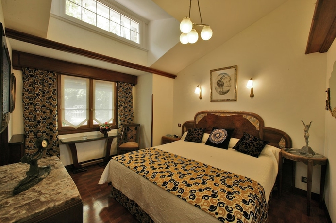 Imagen de la habitación del Hotel Relais and Ch&acirc;teaux Parc Victoria. Foto 17