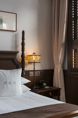 Imagen de la habitación del Hotel Relais and Chateaux Chaptel Hangzhou. Foto 3